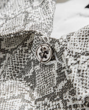 Load image into Gallery viewer, Faux Leather Snakeskin Perforated Cargo Jacket W/Cross (White)
